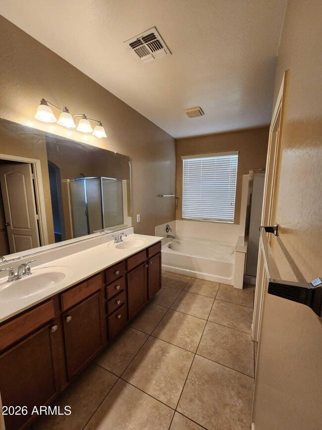 Building Photo - 7643 W Charter Oak Rd