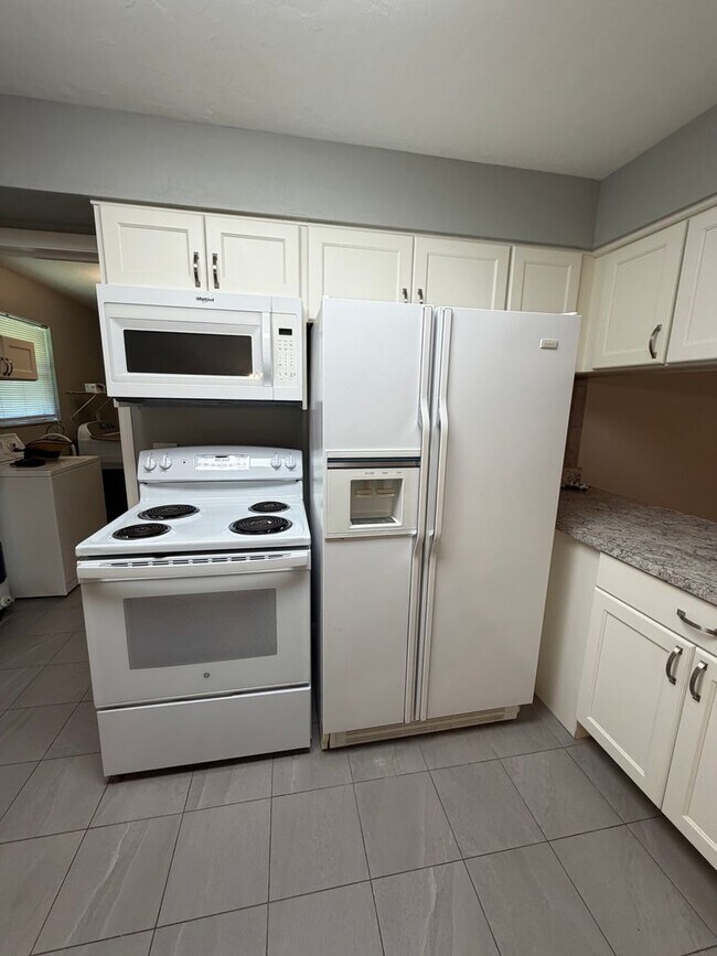Building Photo - Newly renovated, new painted on large lot - mowing included in rent!