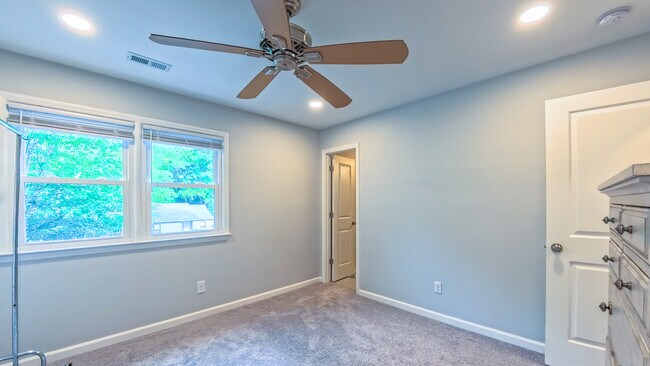 Bedroom #2 looks out on front - 107 Abbots Glen Ct