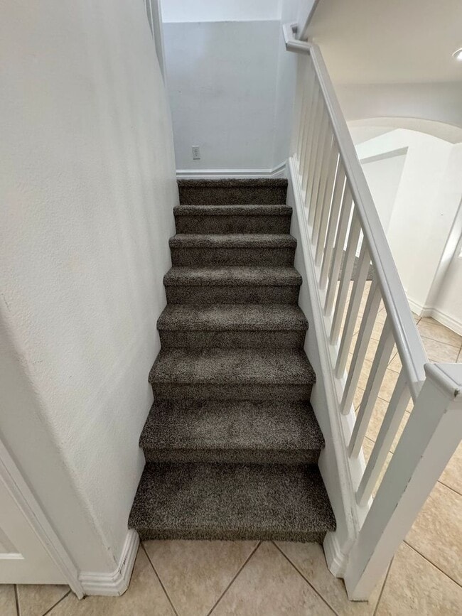 Building Photo - STUNNING 2 STORY HOME IN A GUARD GATED COM...
