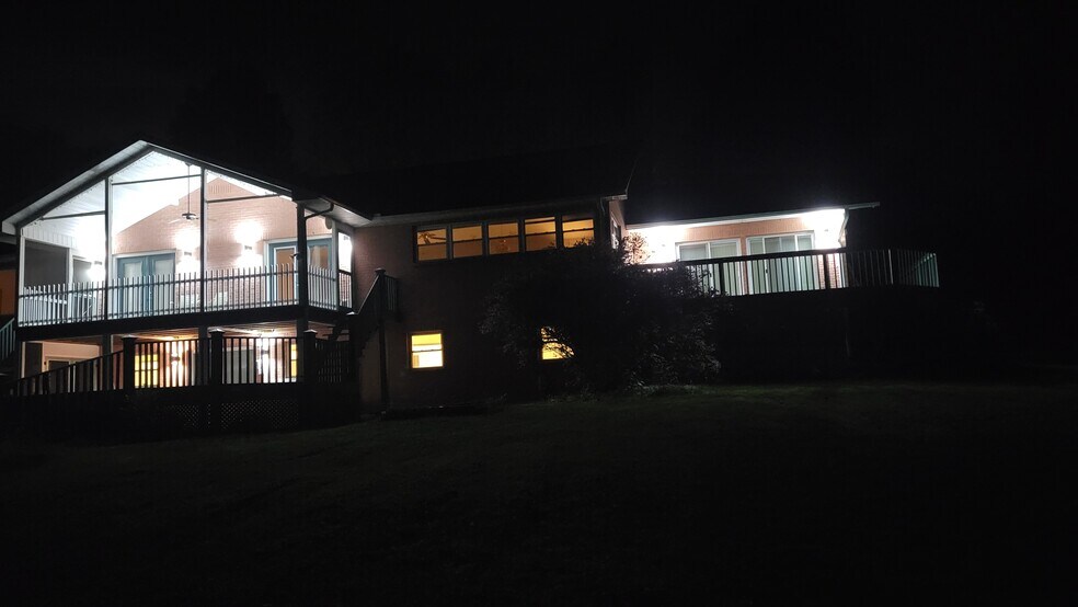 Back Patio at Night - 1835 River Rd