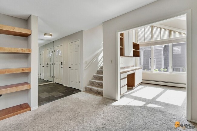 Building Photo - Spacious and bright condo located in a quiet area that boasts the perfect combination of style an...