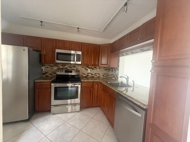 Building Photo - 3050 NW 42nd Ave