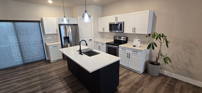 Building Photo - Come check out this beautiful 3 story town...