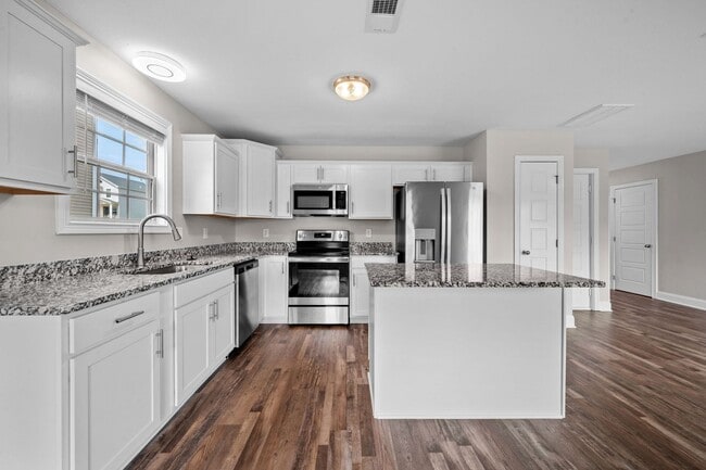 Building Photo - Beautiful Open-Concept Home with Covered Deck & Huge Backyard