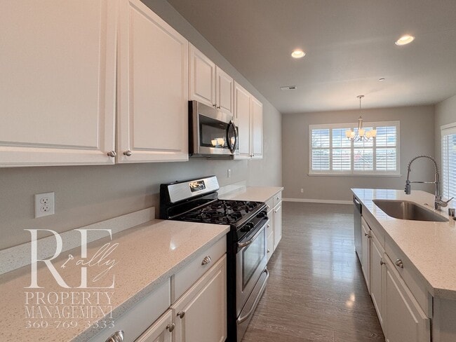 Building Photo - Vaulted Ceilings, Tree-Lined Views & a Spacious Primary Suite Retreat