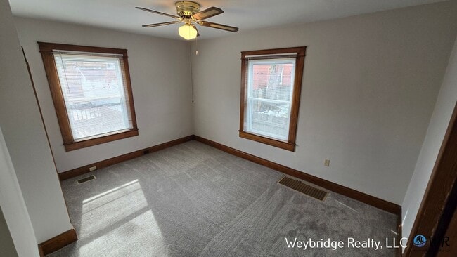 Building Photo - Charming 3BR Home in Norwood with Fenced Yard, Detached Garage & Workshop – Prime Location!