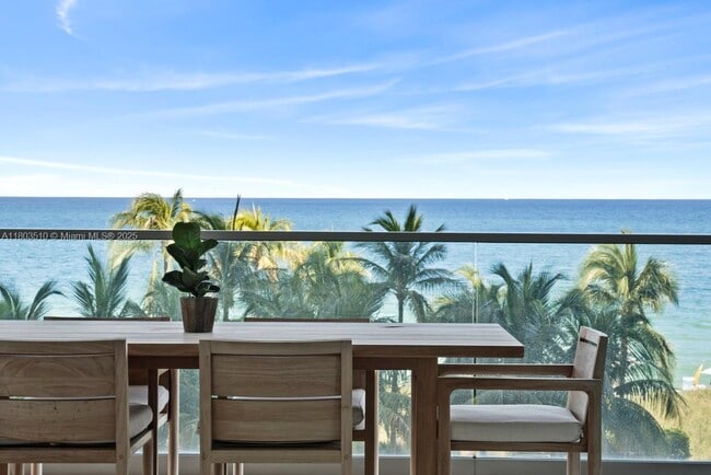 Building Photo - 10203 Collins Ave