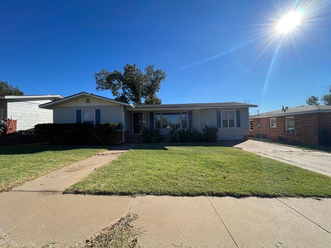 Primary Photo - Spacious Home with Fenced Backyard