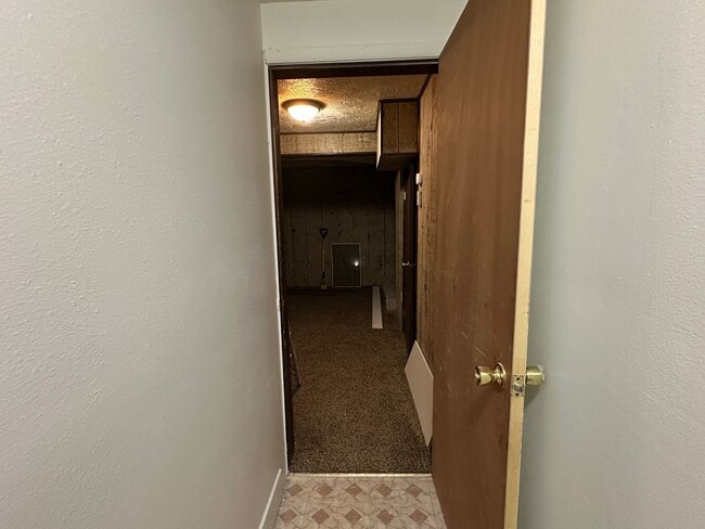 Building Photo - Spacious, three level, 4 Bed 2.5 bath Townhome in Ammon right behind the Walmart on Hitt.