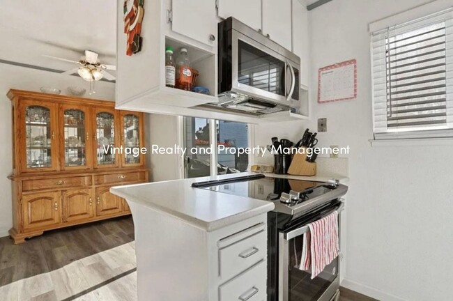 Building Photo - Coming Soon A Charming 2-Bedroom, 1.5-Bath...