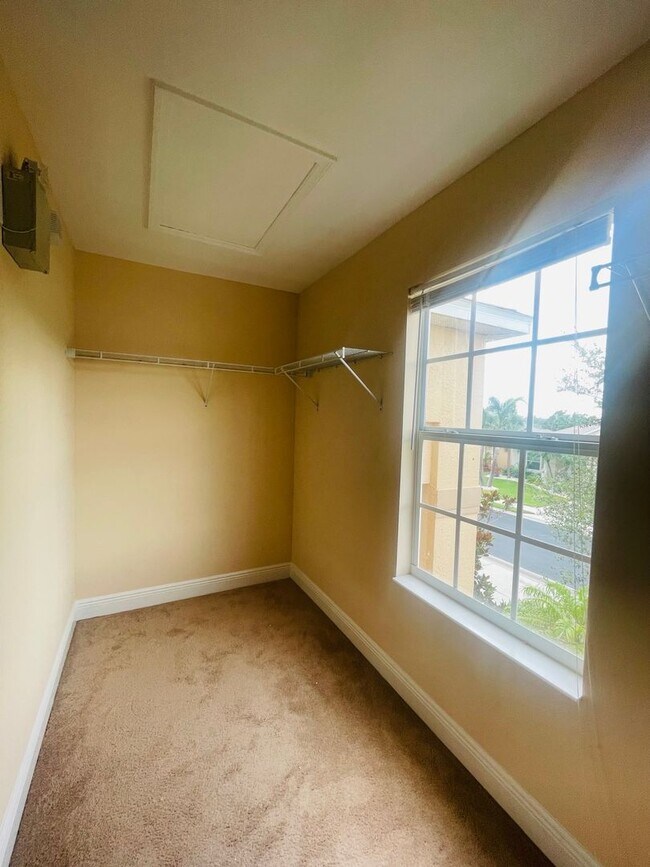 Building Photo - **SUNCOAST LAKES GATED COMMUNITY**