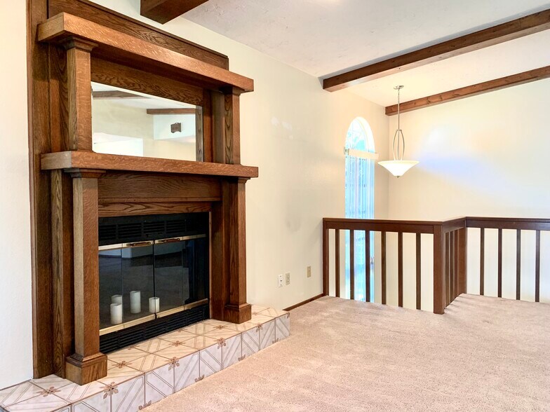 Working wood-burning fireplace. - 5203 15th St W