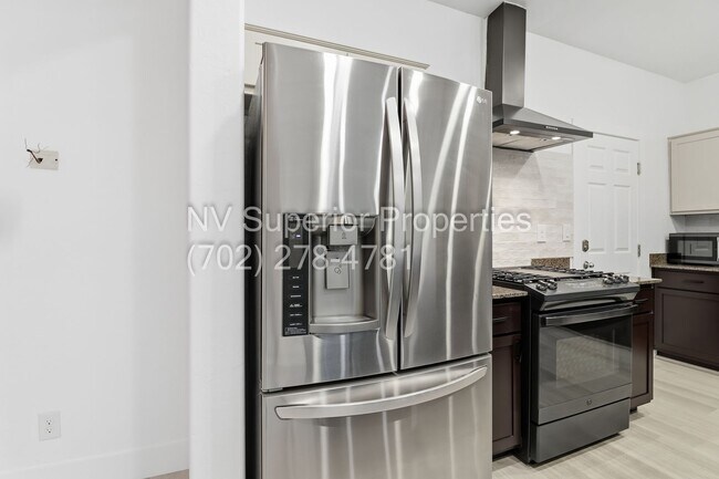 Building Photo - SW!! 2 Story 3 bedroom, 2 car garage!!! All Luxury Vinyl Plank flooring downstairs!!! Water condi...