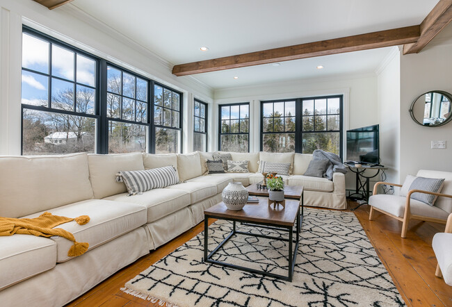 Sunny, airy and breezy living room is so cozy at night! - 96 Spurwink Rd