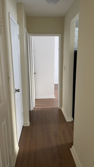 Hallway facing bedroom - 3 Sadore Ln