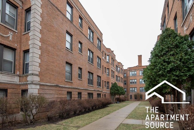 Building Photo - 1365 W Estes Ave