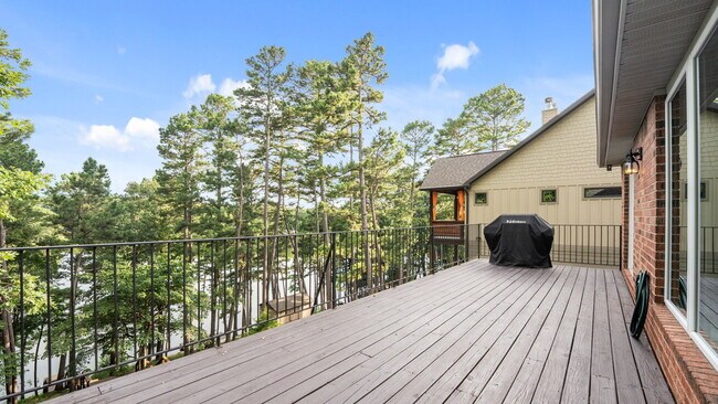 Building Photo - Serene Bella Vista Lakeside 4 bedroom