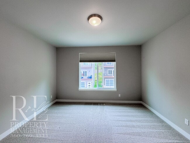 Building Photo - Modern 3-Story Bremerton Home with Water Views on Every Level