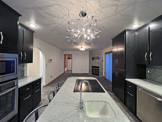 Building Photo - Stunning 4 Bedroom 2.5 Bath with Peek-a-Boo View of Puget Sound