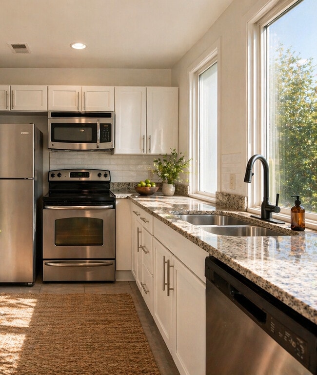 2BR, 2 1/2BA Penthouse Unit 312 Kitchen - The 700