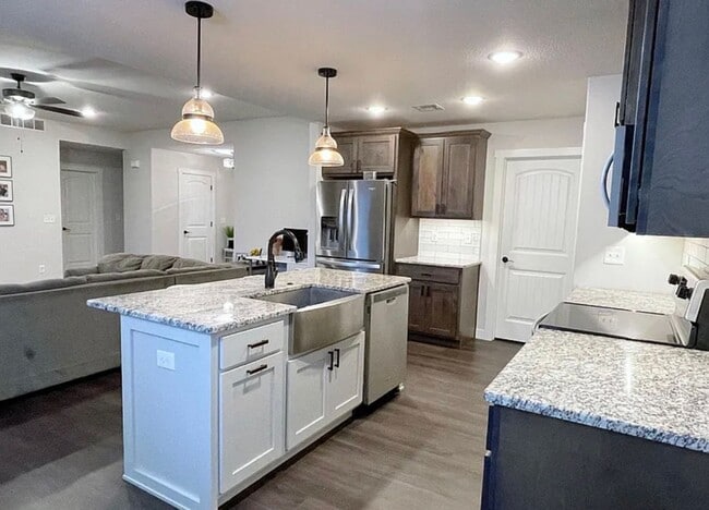 Building Photo - 3-Car Garage + Spacious Yard + Stainless Appliances + Fireplace + Near NEW Oliver Brown Elementary