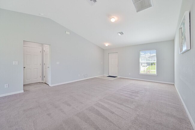 Building Photo - Spacious Three-Bedroom Home with Open Floor Plan, Large Yard