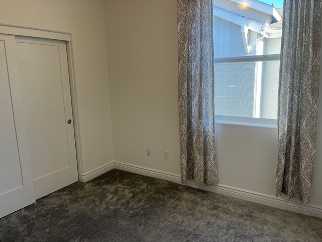 Building Photo - Spacious 3 Bedroom 2 Full Bath Condo with Stunning Views and Energy Savings