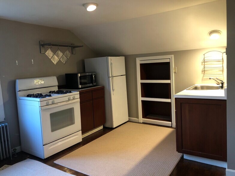 Kitchen on one side with living room on the other side - 126 Clover Hill St