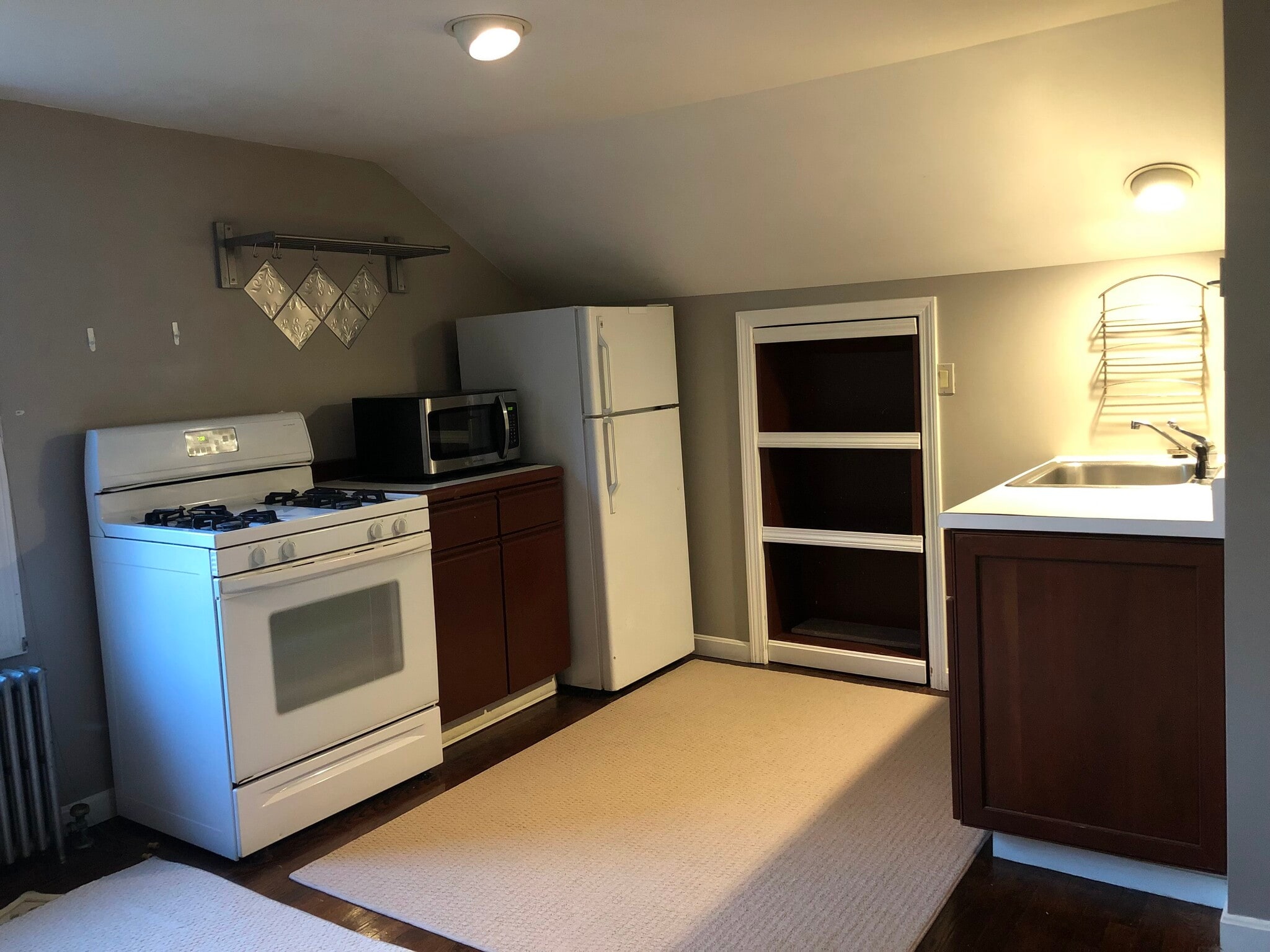 Kitchen on one side with living room on the other side - 126 Clover Hill St