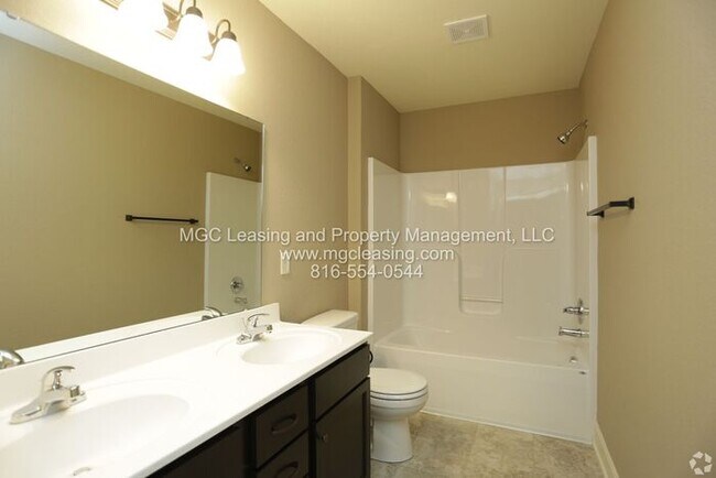 Building Photo - Eagle Creek Townhomes - Exterior Townhome - Your New Home Comes with Big Monthly Savings