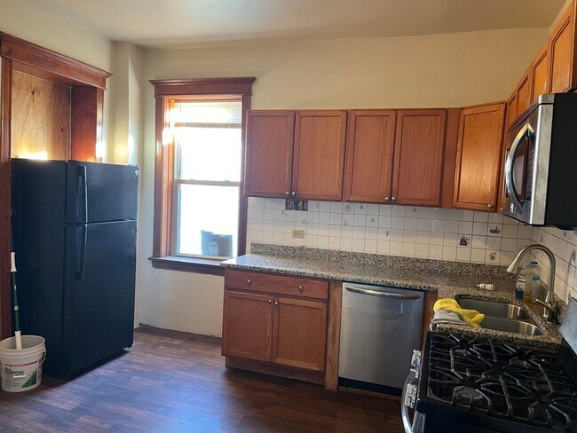 Building Photo - 4154 W 21st Pl