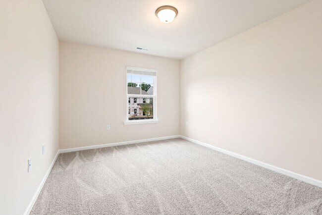 Building Photo - Like-New Townhome Walk to Downtown | Garage + Internet Included