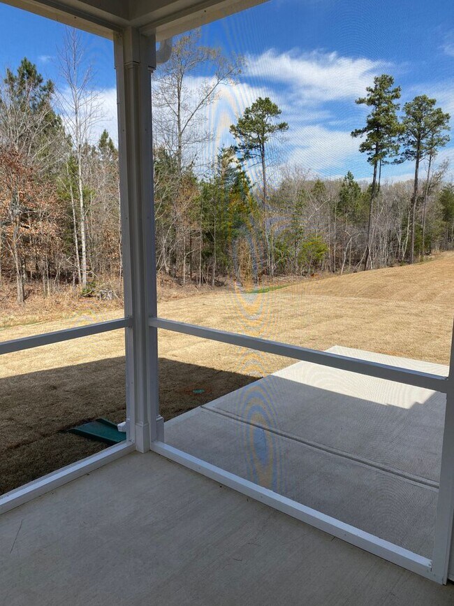 Building Photo - Spacious 1.5-Story 4BR Home with Bonus Room in Active 55+ Community