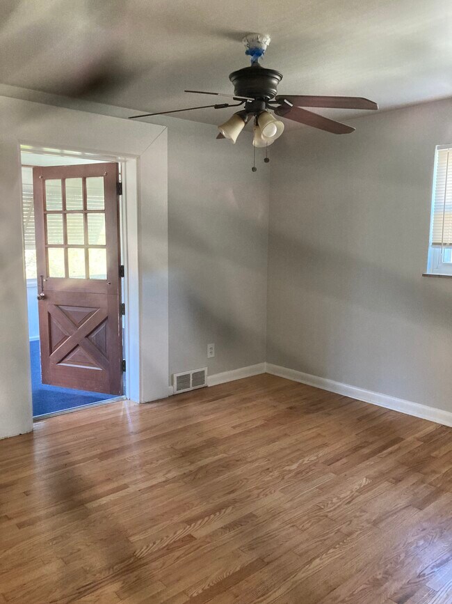 bedroom leading to back covered porch - 3714 Section Rd