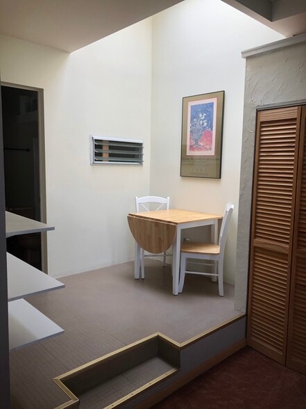 Step up to office/dining space large skylight - 3313 N Clark St