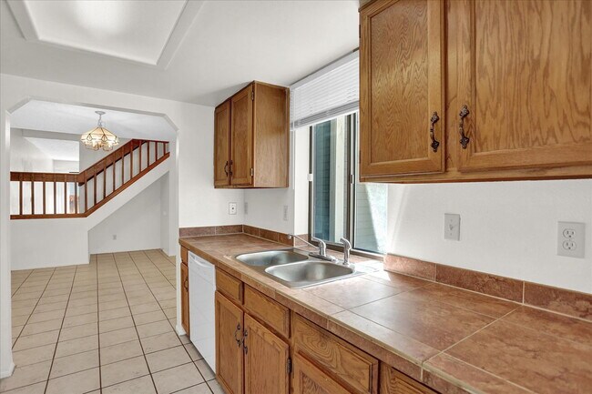 Building Photo - Cute 2 Bedroom 2.5 Bath Townhome in Cherry Creek Schools, 2 Reserved Parking Spots, Great Locatio...