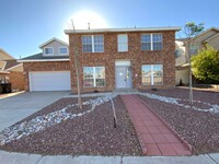 Building Photo - 4 Bedroom Home Available Near Unser Blvd N...