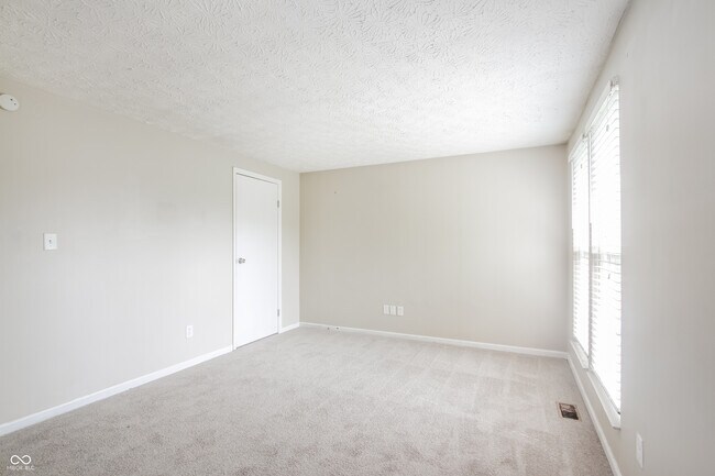 Building Photo - 5678 Colonist Cir