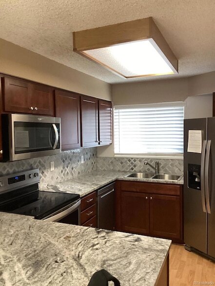 Building Photo - 8733 W Cornell Ave