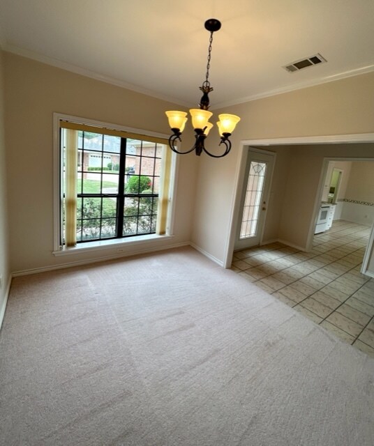 Formal dining room looking towards front enry and kitchen - 806 Torribrooke Ln