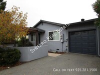 Building Photo - Charming Single Story Duplex with Garage o...