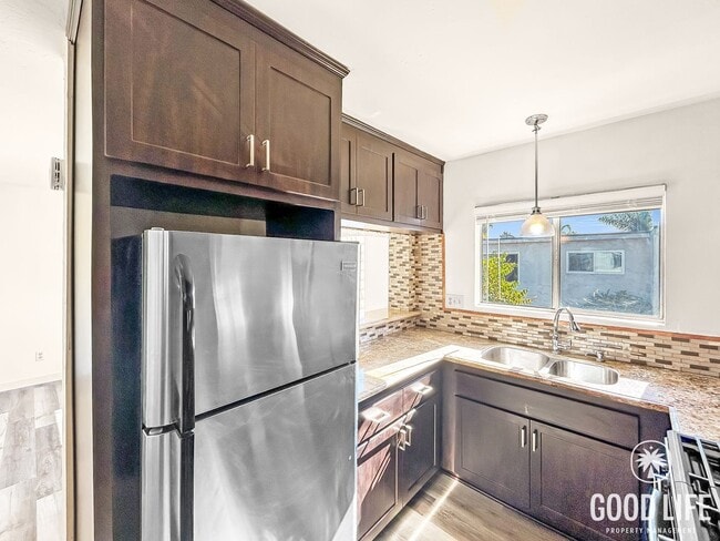 Building Photo - Beautiful 1BD/1BA W/ Laundry On-Site and Reserved Parking in Corridor!