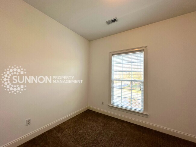 Building Photo - Wooded, Charming 3 Bedroom with Tons of Space