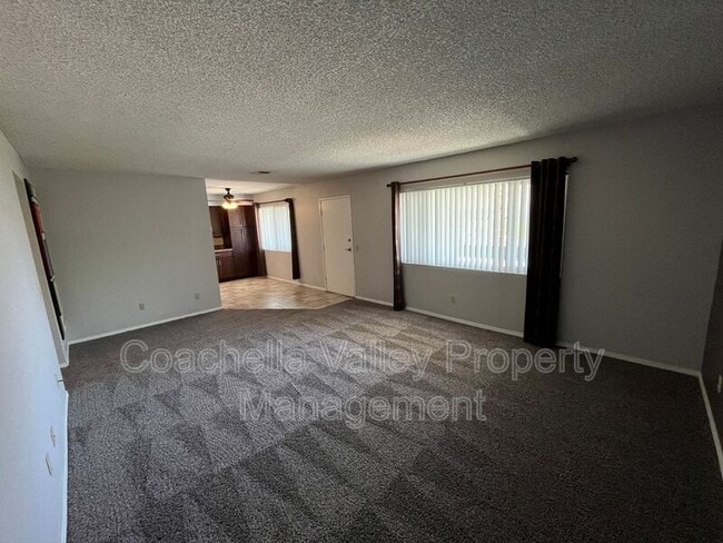 Building Photo - 1950 S Palm Canyon Dr