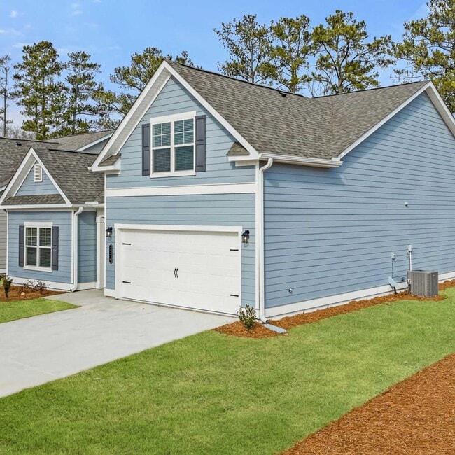 Exterior of the Wakefield, two story home with a private driveway and attached garage. - Salem Oaks