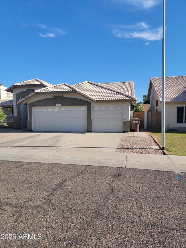 Building Photo - 8529 W Joan De Arc Ave