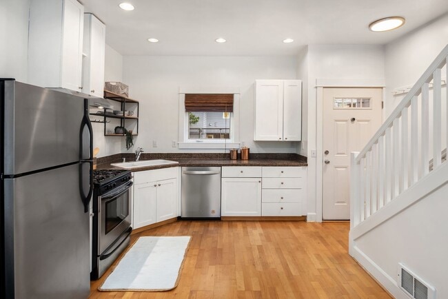 Building Photo - A Quiet Retreat with Parking, Patio, and City Proximity