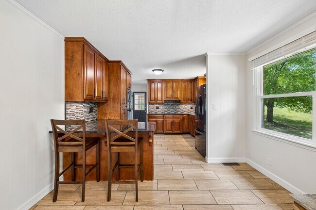 Building Photo - Pet Friendly Four Bedroom with Basement!