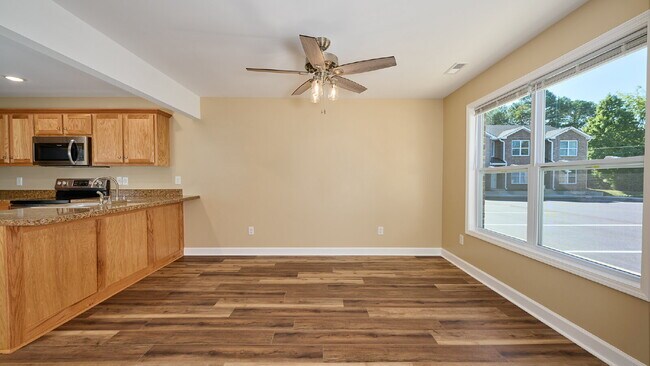 Building Photo - Special: 2BR, 1 1/2BA townhouse $300 off first month